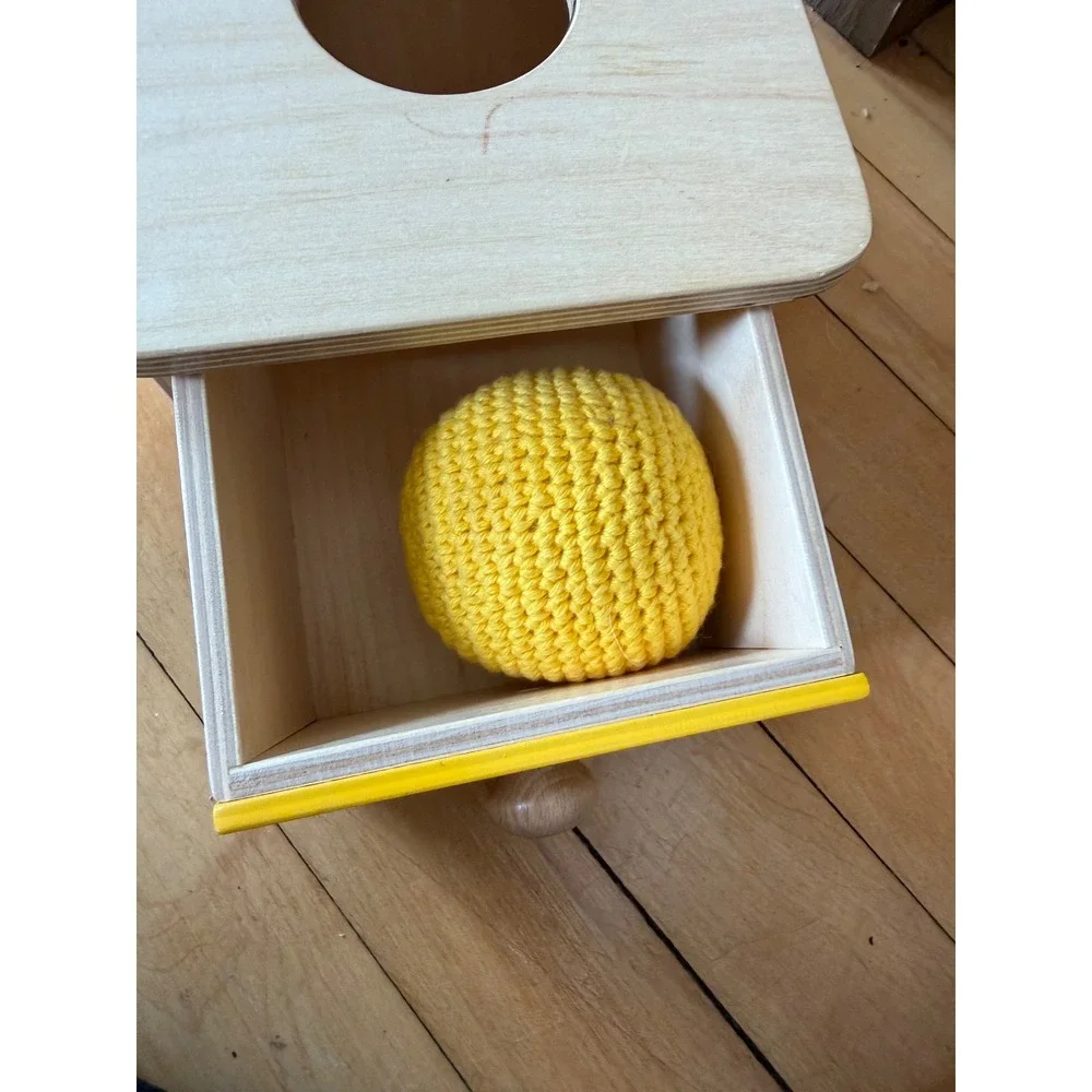 Monti Kids motor planning wooden yellow‎ box with drawer and yellow knit ball